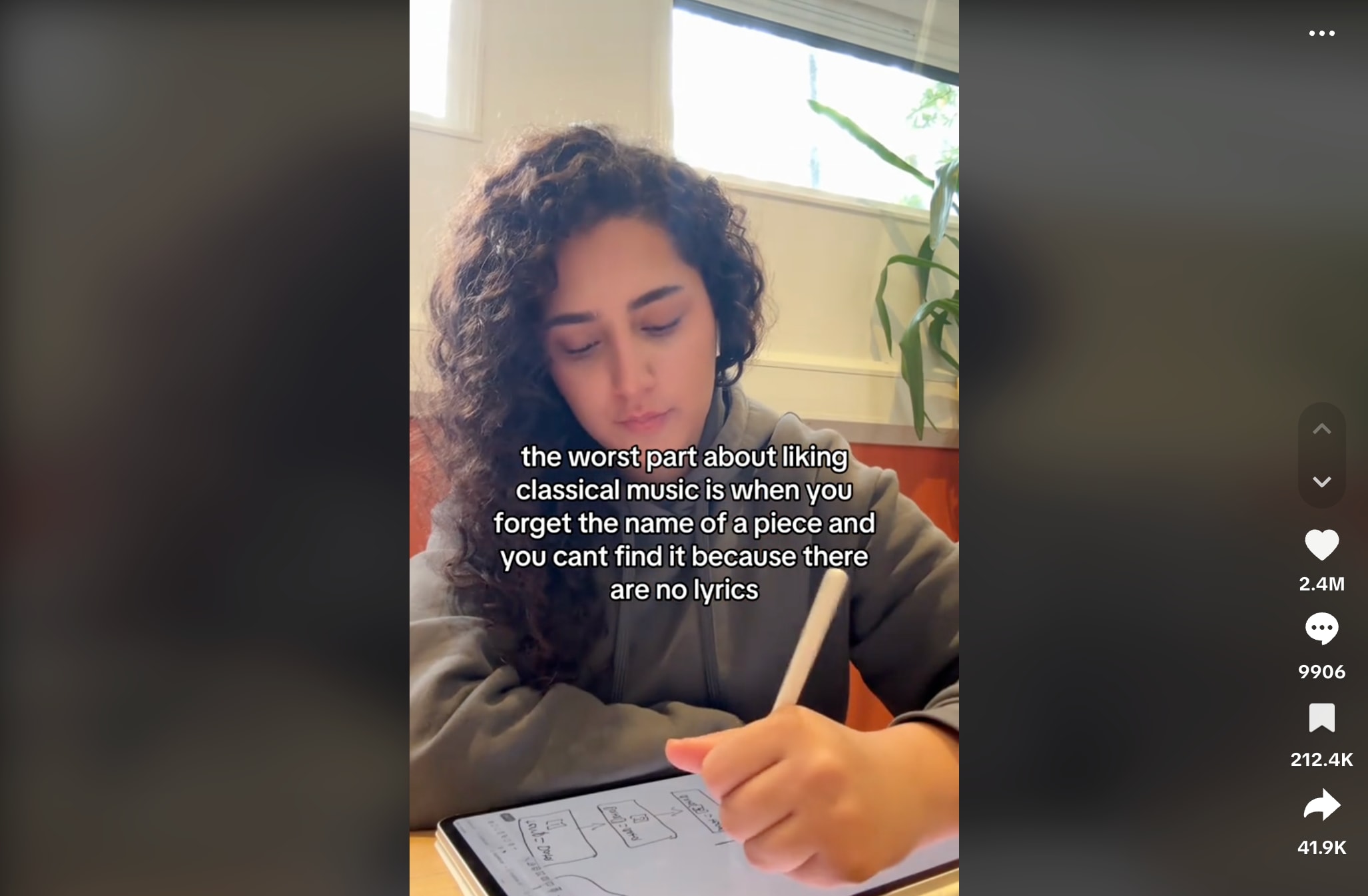 A screenshot from TikTok video by bahar.gy’s showing herself studying and writing notes with text overlay