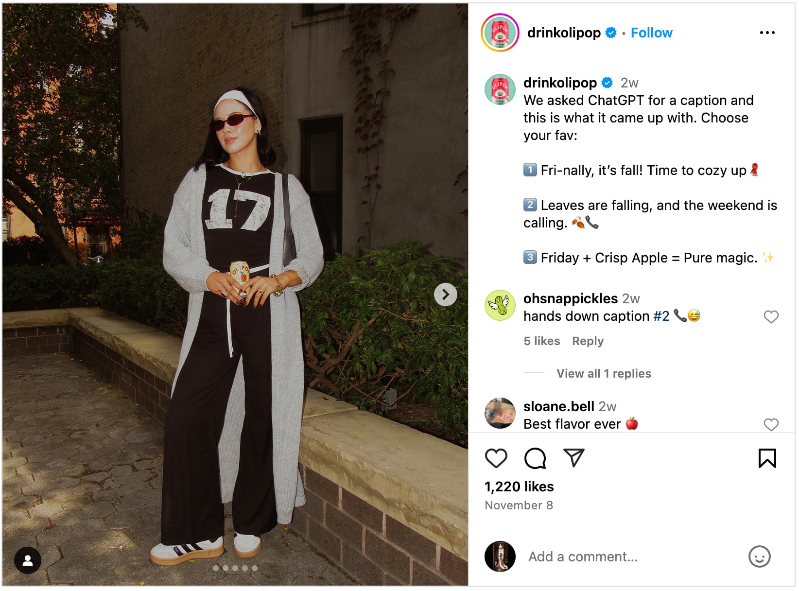 Person in a casual fall outfit holding an Olipop drink
