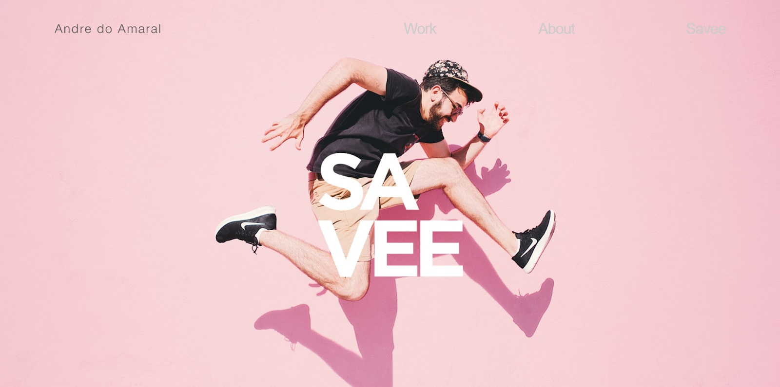 Savee page person jumping up with a pink background behind him