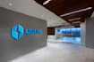 create 25 realistic office wall mockups featuring your logo
