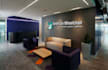 create 25 realistic office wall mockups featuring your logo