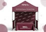 create tent setup including banners table cover and backdrop