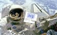 place your message or logo on a sign held by an astronaut