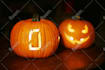 create halloween logo carving on a pumpkin fast