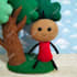make a cute plush doll using felt fabric with beads eyes