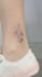 create a fine line flower tattoo