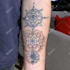 create custom mandala and black work tattoo design