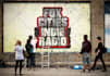 create a graffiti on wall with your text, logo or photo
