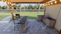 create a 3d outdoor kitchen , deck , porch , gazebo , garden