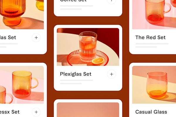 Colorful glassware sets displayed in a modern product grid layout