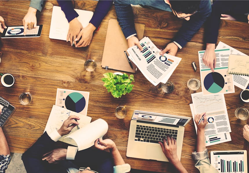 People discussing a company's mission statement