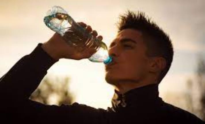 Roblox boy drinking a bottle of water