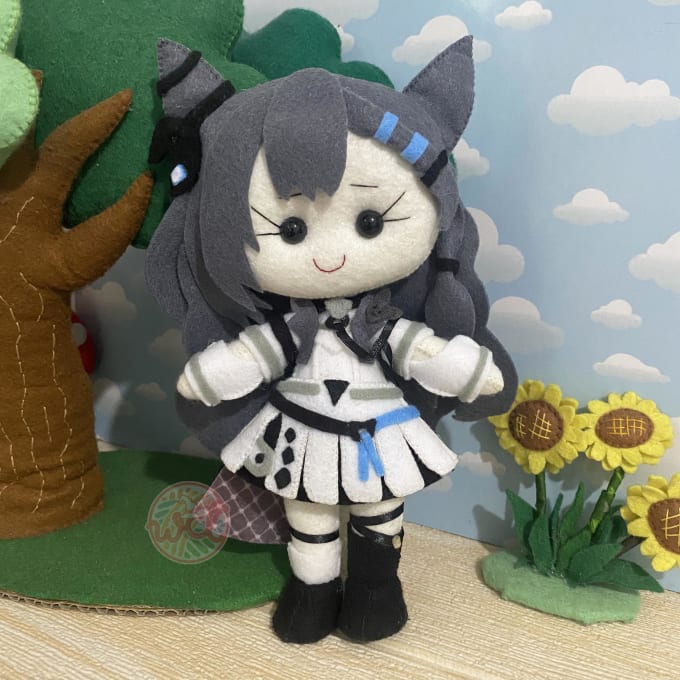 make a cute plush doll using felt fabric with beads eyes