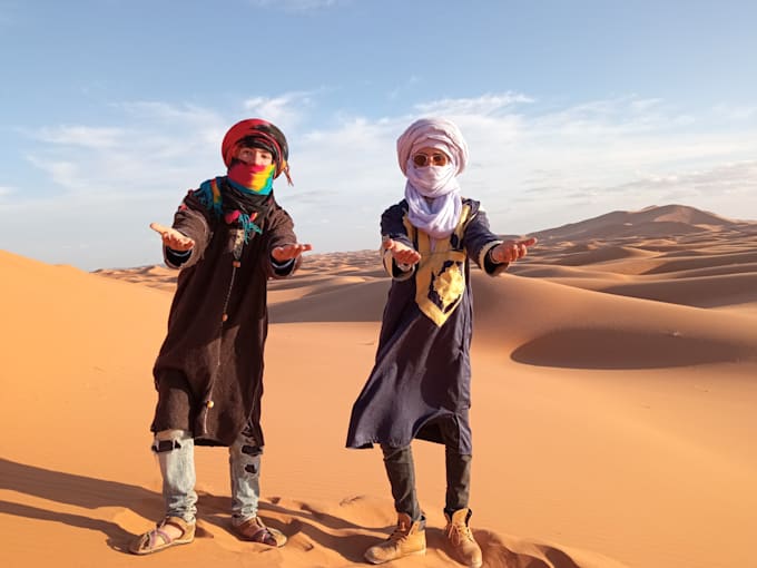 wish you a happy birthday in the sahara desert with a guitar