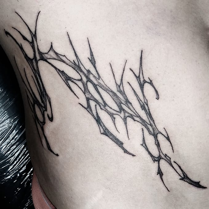 make a trash tipe tribal tattoo for you