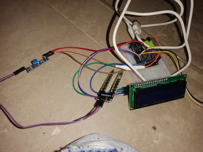 Program the smart irrigation system with esp32 esp8266 and soil Circuit Diagram
