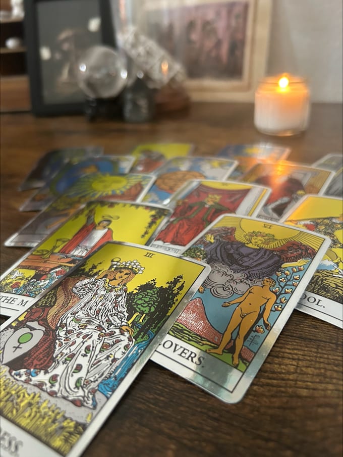give you either a tarot or cartomancy reading