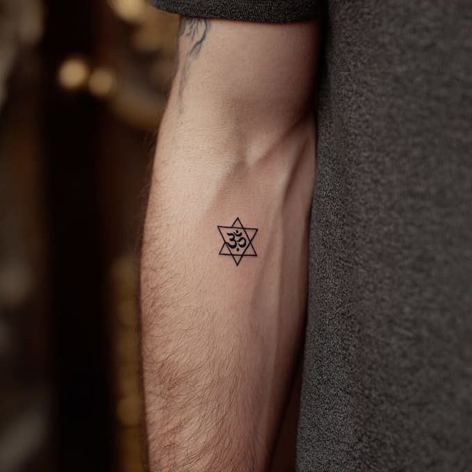 create a small, minimalistic, fine line spiritual tattoo
