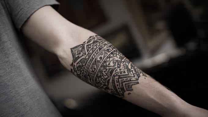 custom an abstract black tattoo design