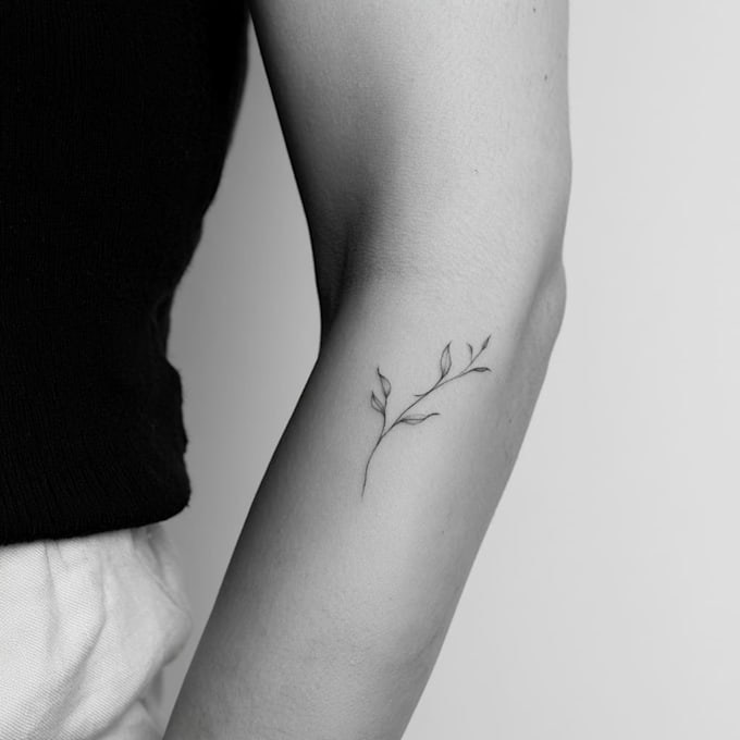 design a minimalist fine line tattoo