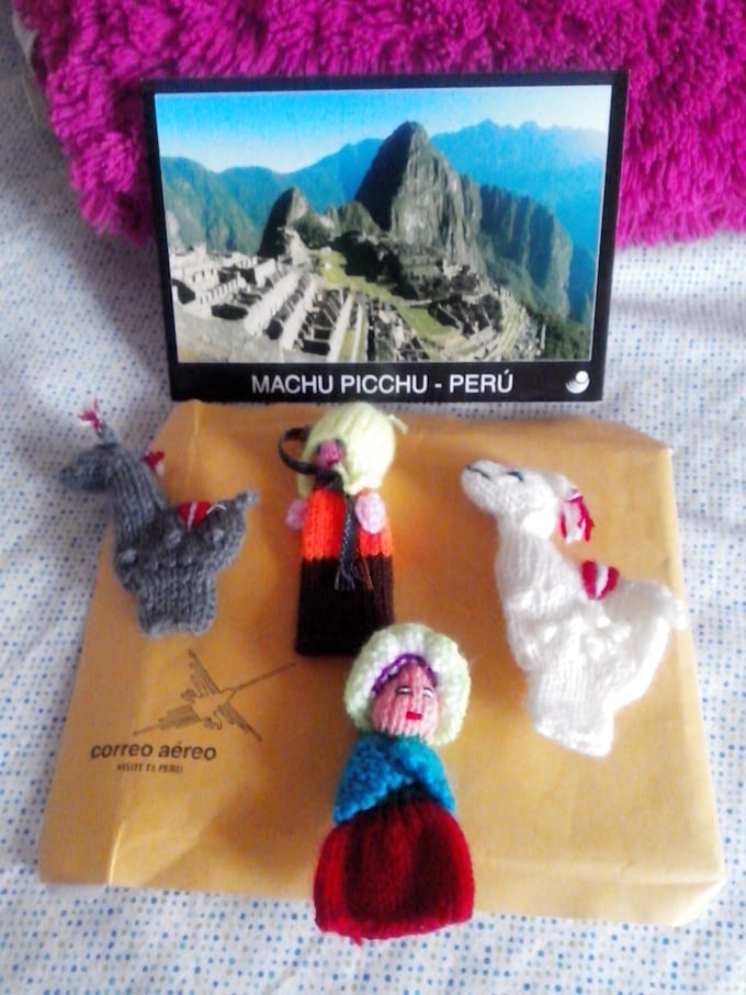 send you a postcard, and a finger puppet from peru