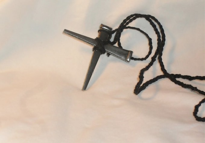 make you a cross necklace made from nails