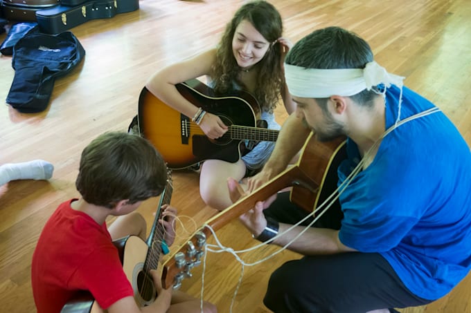 teach you any song on guitar