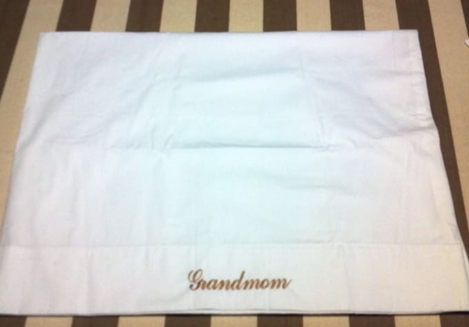 embroider your name on a white pillowcase