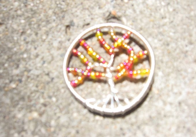 send you this sterling plated Autumn tree pendent