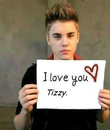 put your name on a sign held by Justin Bieber