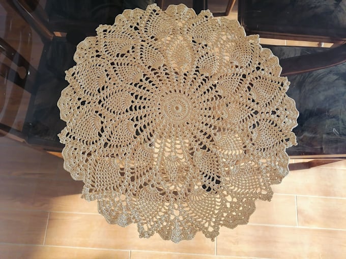 make a delicate large size crochet doily