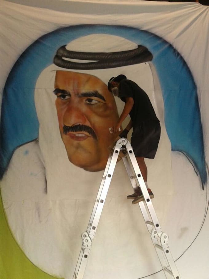 painting a real graffiti realistic on the street wall