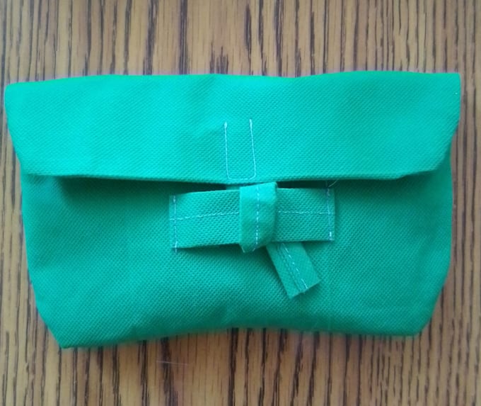 teach you how to sew a clutch using recycled materials