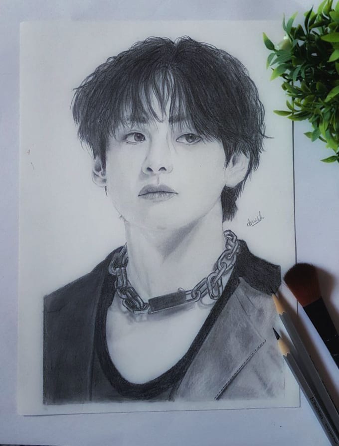 make a realistic portrait sketch using charcoal and graphite