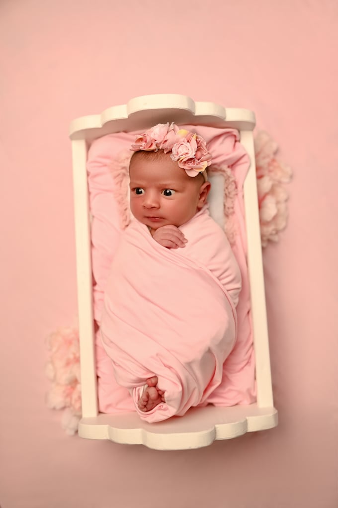 professionally retouch newborn photos