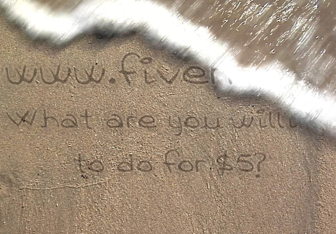 make HD Video of a sea wave reveal your message on sand
