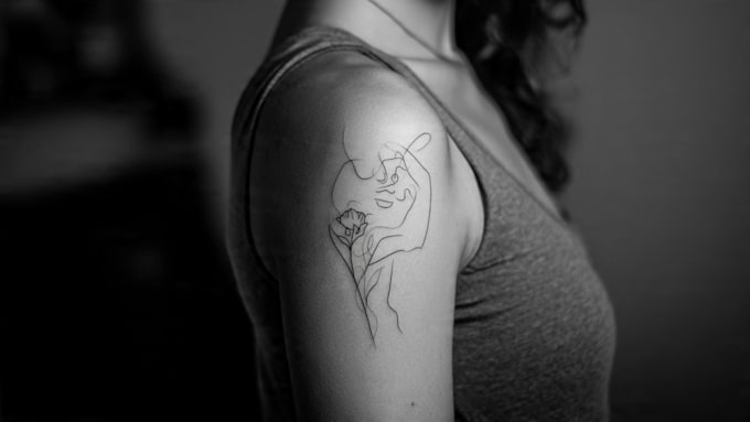 create a minimalist fine line tattoo design