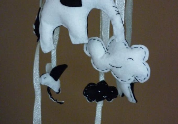 create a black and white brain stimulating mobile for baby/pets using felt
