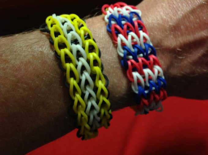 Make a cool rubber band bracelet by Hockeydude20