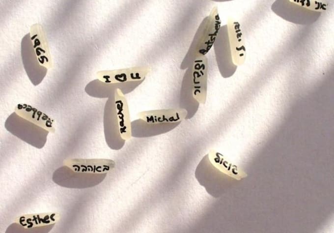 Writing on grain of rice world record image