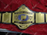 design exact replicas or custom championship belts with personalized straps