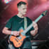 teach you a beginning to high level guitar or bass lesson