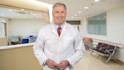 create medical spokesperson video in lab coat or scrubs