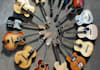 singing and strumming guitar