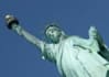 take pictures of the statue of liberty from the Staten Island ferry