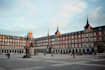 send 2 postcards with any message, from Madrid
