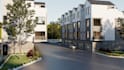 create photorealistic townhouse exterior renders and streetscape visuals