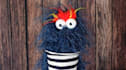 create a fun video with a blue hairy monster puppet