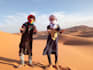 wish you a happy birthday in the sahara desert with a guitar