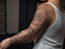 draw a geometric sleeve tattoo design